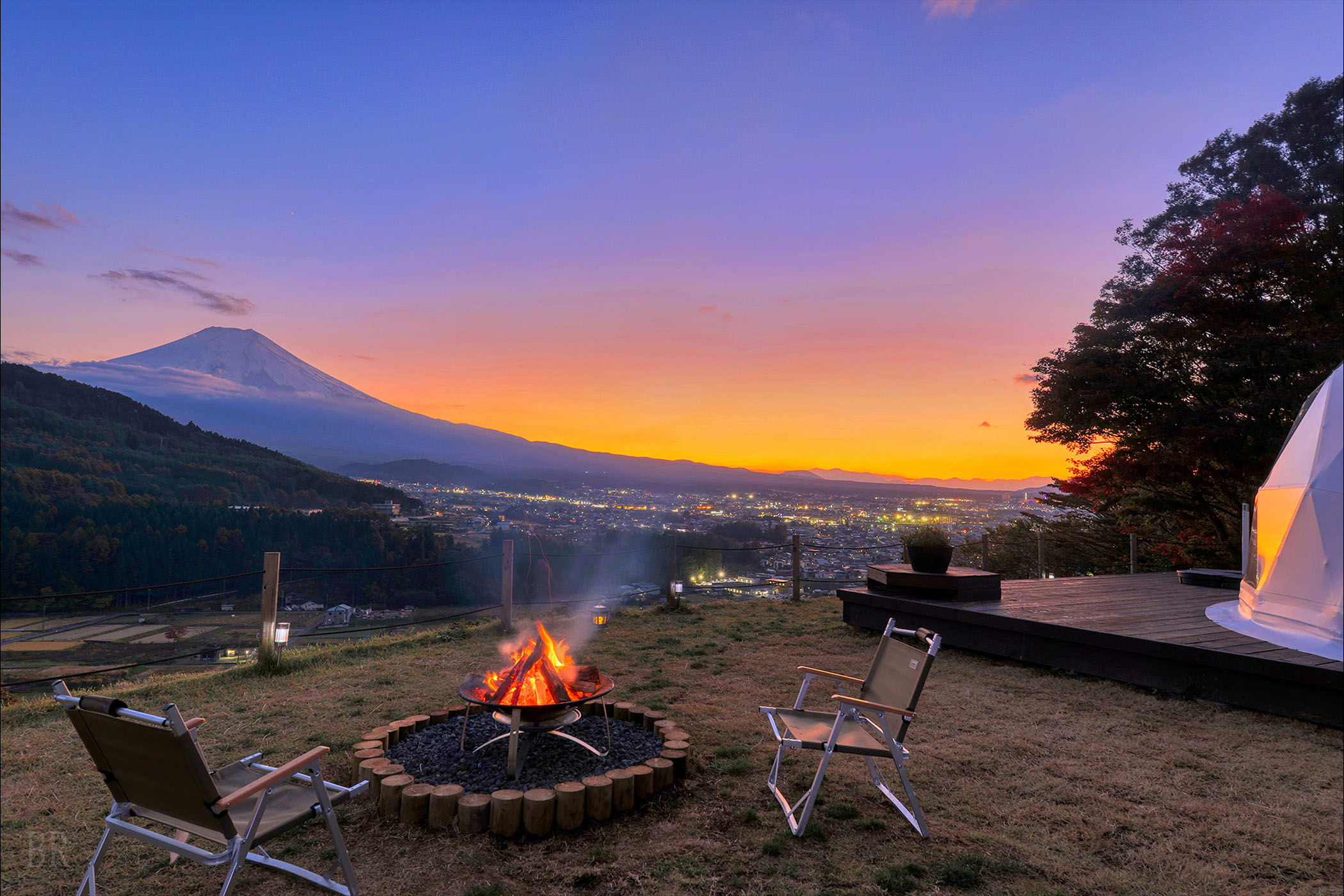 Mount Fuji at sunset and a campfire at Shakushi Gateway Camp