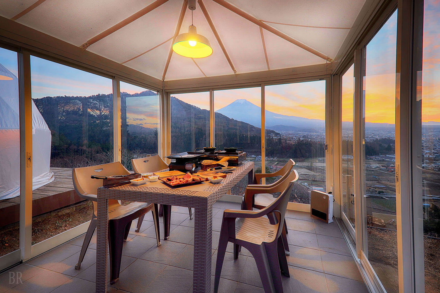 Dining area with views of Mount Fuji at Shakushi Gateway Camp